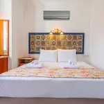 Aparthotel Oezguem